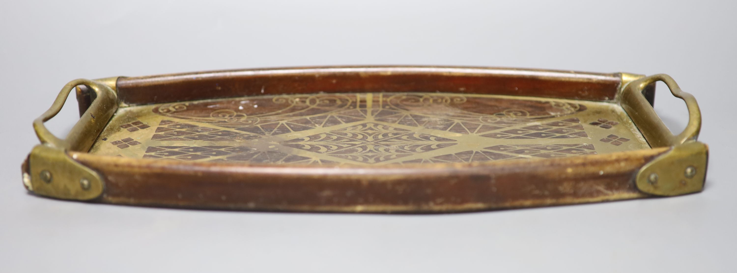 An Austrian brass inlaid tray, possibly Wiener Werkstatte, length 36cm